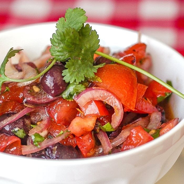 Tomato Olive Salad. A Greek inspired side dish or satisfying lunch meal!